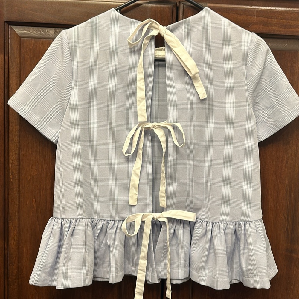 Tie-back Detailed, unique, peplum blouse